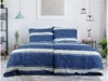 A neatly made bed with blue and white striped bedding. Náhled obrázku produktu