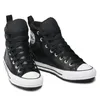 A pair of black high-top Converse sneakers with white soles, shown from a slightly elevated side angle against a white background. Produktbild-Vorschau
