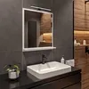 A modern bathroom vanity with a rectangular mirror, sink, and faucet. Náhled obrázku produktu