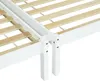 A close-up view of the corner of a white wooden bed frame with wooden slats. Náhled obrázku produktu