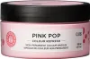 A product shot of a pink jar with a black lid, featuring product information on a label. Anteprima dell’immagine prodotto