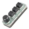 A small, programmable keyboard with a rotary encoder and three mechanical keys, shown from a slightly elevated angle against a white background. Podgląd zdjęcia produktu