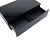 A black coffee table with two open drawers, shown from a high angle. Anteprima dell’immagine prodotto