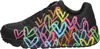 A side view of a single black sneaker with colorful heart graphics. Voir les images du produit