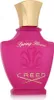 A studio shot of a pink Creed Spring Flower Eau de Parfum bottle with a gold cap. Anteprima dell’immagine prodotto