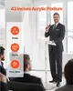 A man in a suit is presenting at a podium in front of an audience. Náhľad obrázku produktu