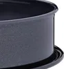 A close-up view of the rim and side of a dark gray springform cake pan with a textured surface. Anteprima dell’immagine prodotto