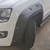 Perspektivische Produktansicht schräg: Für VW Amarok 1 2010-2016 Radlauf Kotflügel 8cm Verbreiterung Radlaufblenden () Voir les images du produit