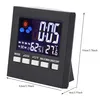 A digital alarm clock displaying time, date, temperature, and humidity. Produktbild-Vorschau