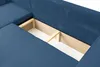 Close-up of the storage compartment of a blue corduroy sectional sofa. Produktbild-Vorschau
