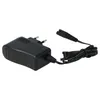 A black power adapter with a coiled cord and a connector. Produktbild-Vorschau