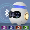 A futuristic-looking alarm clock with a digital display and a Bluetooth symbol in the background. Multiple color options are shown in smaller inset images at the bottom. Produktbild-Vorschau