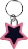 A pink star-shaped keychain with a black center, attached to a silver keyring. Produktbild-Vorschau