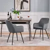 A dining room setting with two chairs and a table. Produktbild-Vorschau