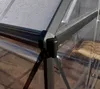 Close-up view of the corner joint of a greenhouse frame, showing the aluminum structure and clear panels. Produktbild-Vorschau