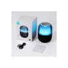 A product shot of a Joyroom Bluetooth speaker, its packaging, and accessories on a white background. Náhled obrázku produktu