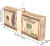 A close-up of a glass ornament shaped like a stack of US dollar bills. Podgląd zdjęcia produktu
