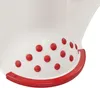 A close-up view of the bottom of a white plastic step stool with red polka dots and a red trim. Anteprima dell’immagine prodotto