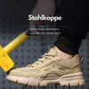 A person wearing a safety shoe is shown with a hammer about to strike it, demonstrating its protective features. Produktbild-Vorschau