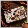 Kandylas Halva Kakao & Stevia 200 g Verpackung im rustikalen Setting mit braunem Stoff Produktbild-Vorschau