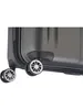 A close-up view of the wheels of a gray suitcase. Anteprima dell’immagine prodotto