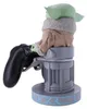 A figurine of Grogu from Star Wars, holding a video game controller, displayed on a stand. Anteprima dell’immagine prodotto