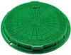 A green manhole cover with a decorative pattern and a central image of a bird. Produktbild-Vorschau