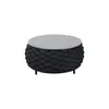 A round coffee table with a woven base and a stone-like top, isolated on a white background. Produktbild-Vorschau