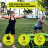 Two people playing PaddleSmash in a park with a net and ball. Produktbild-Vorschau