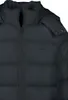 Close-up of a black puffer jacket. Produktbild-Vorschau