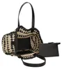 Sac tressé, noir et beige, avec des poignées en cuir Voir les images du produit 6
