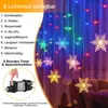 A curtain of snowflake-shaped LED lights with various modes and a timer function. Náhled obrázku produktu