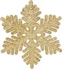 A single glittery gold snowflake ornament. Anteprima dell’immagine prodotto