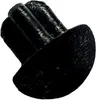A black plastic cap with multiple prongs. Produktbild-Vorschau