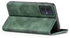 A green flip case for a smartphone, shown from a side angle. Produktbild-Vorschau