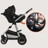 A stroller with a car seat attached, and an inset showing the car seat installed in a car. Produktbild-Vorschau