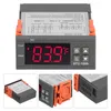 A digital temperature controller with a red LED display showing 83.9°F, along with control buttons and connection diagrams. Produktbild-Vorschau