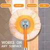 A mop head is shown in the center of the image, with different floor surfaces (laminate, marble, hardwood, tile) depicted around it. Text indicates it works on any surface. Náhled obrázku produktu