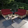 Outdoor patio furniture set with pallet sofas and a coffee table on a deck. Voir les images du produit