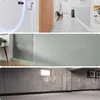 A collage of three images showing different interior spaces and details, including a hallway, a wall with a table, and a concrete wall. Anteprima dell’immagine prodotto