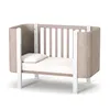 A baby crib with a mattress and pillow, set against a white background. Produktbild-Vorschau