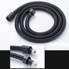 A black shower hose coiled on a white background. Produktbild-Vorschau