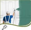 A person is painting a wall with a spray gun. Podgląd zdjęcia produktu