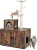 A multi-level cat tree with a cabinet base and two cats interacting with it.