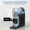A slush machine with a transparent water tank filled with liquid, shown on a countertop with a water splash background. A black rectangle with the word 'RINSE' is overlaid on the left side, pointing to the machine's control panel. Produktbild-Vorschau