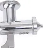 A close-up, side view of a shiny metal manual juicer attachment. Produktbild-Vorschau