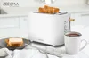A white toaster with two slices of toast in it, a plate of buttered toast, and a mug of tea on a kitchen counter. Anteprima dell’immagine prodotto