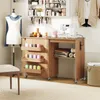 A sewing table with a sewing machine, mannequin, and various sewing supplies. Produktbild-Vorschau