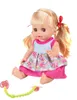 A baby doll with blonde hair and a floral dress is sitting on a white background. Produktbild-Vorschau