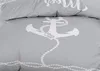 A close-up view of a grey duvet cover with a white anchor and rope pattern. Produktbild-Vorschau
